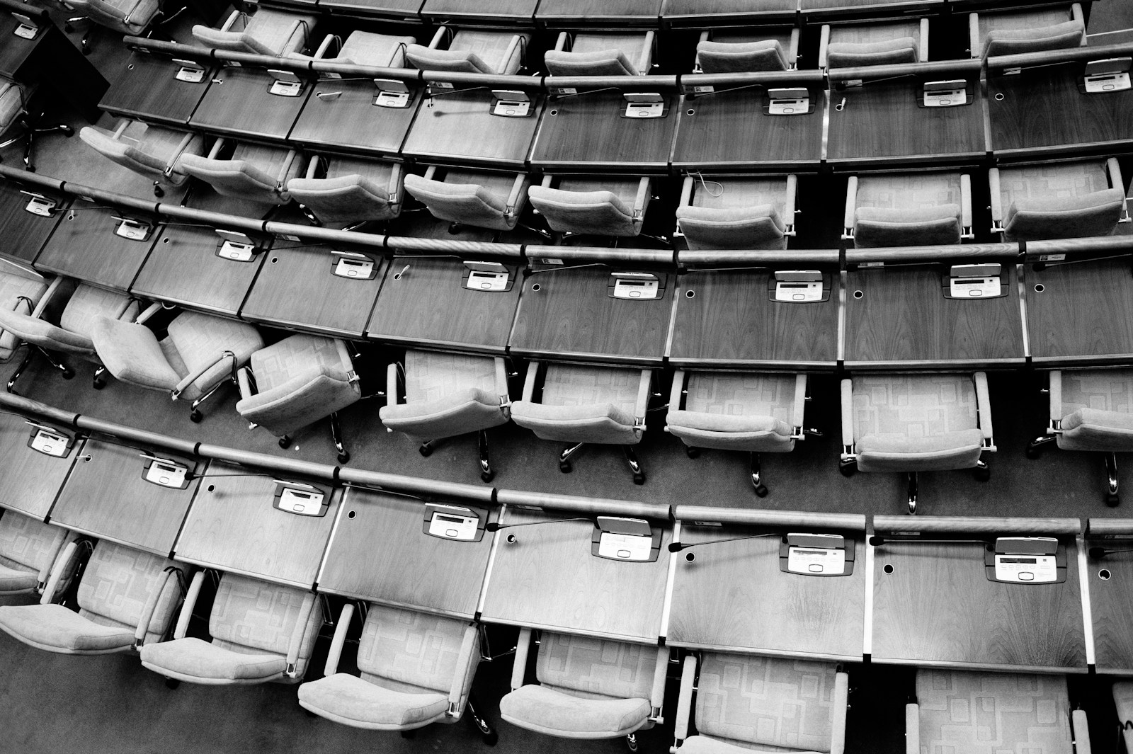 Empty rows of parliamentary seating
